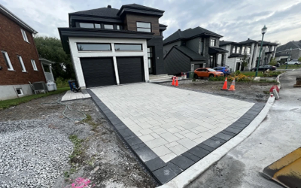 Interlocking paver driveway installation, Greater Montreal