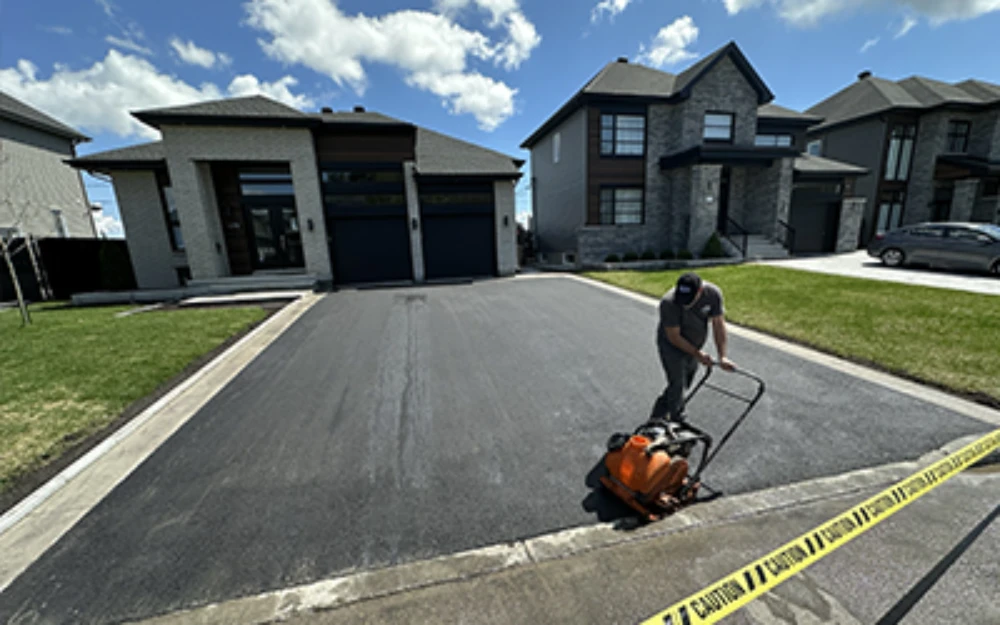 Residential asphalt driveway installation by Terrovia Inc., Montreal